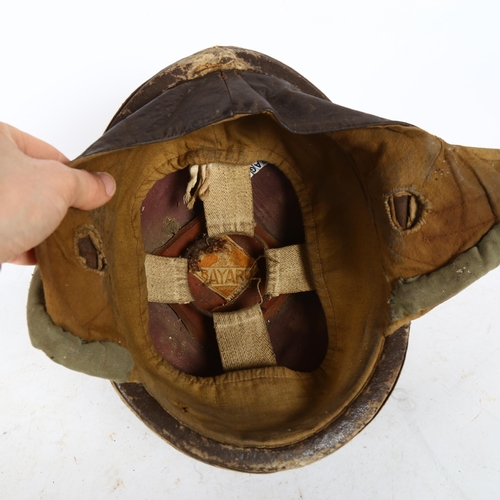 577 - A Vintage motorcycle helmet, with label for Bayaro, with original lining