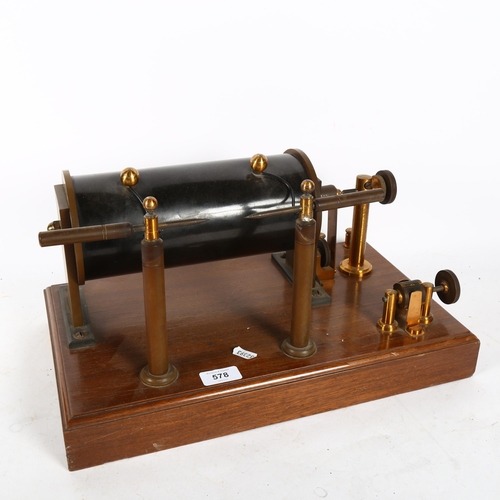 578 - A Vintage induction coil spark machine, on stand, width 44cm