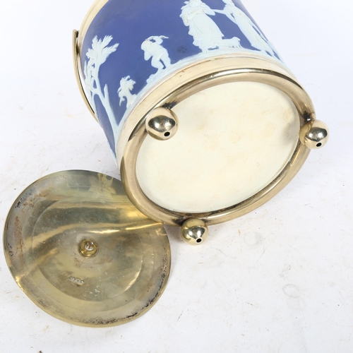 582 - A Wedgwood blue Jasperware biscuit barrel, with plated mounts