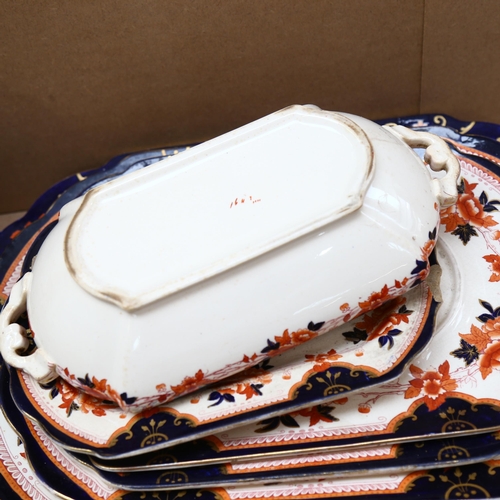 583 - A Victorian Imari pattern part-dinner service, to include tureens and covers, 4 graduated meat plate... 