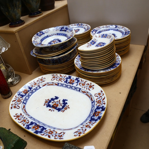 584 - A Victorian Minton's part-dinner service, to include meat plate, 27 dinner plates etc