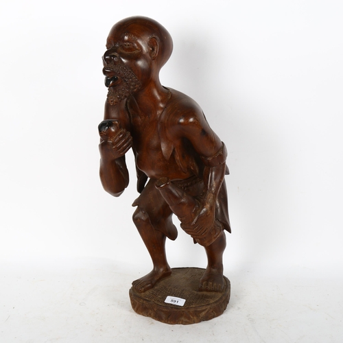 591 - A large African Tribal carved hardwood figure, height 55cm