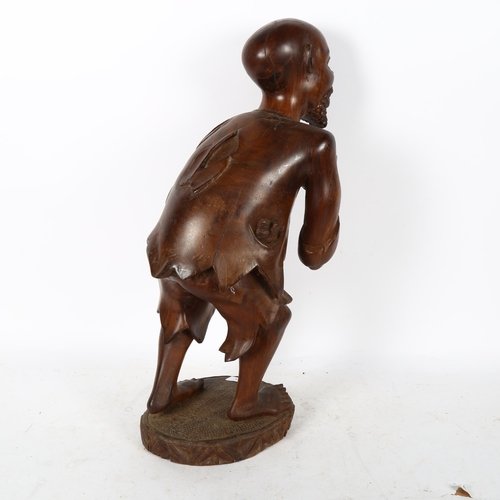 591 - A large African Tribal carved hardwood figure, height 55cm