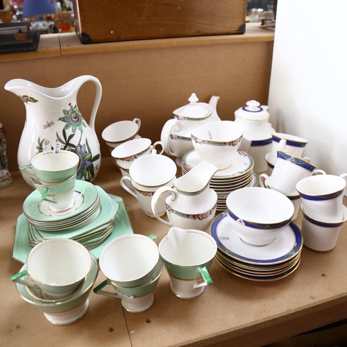 600 - A Royal Doulton Orchard Hill tea set for 6 people, and a Royal Doulton Regalia tea set for 6 people ... 