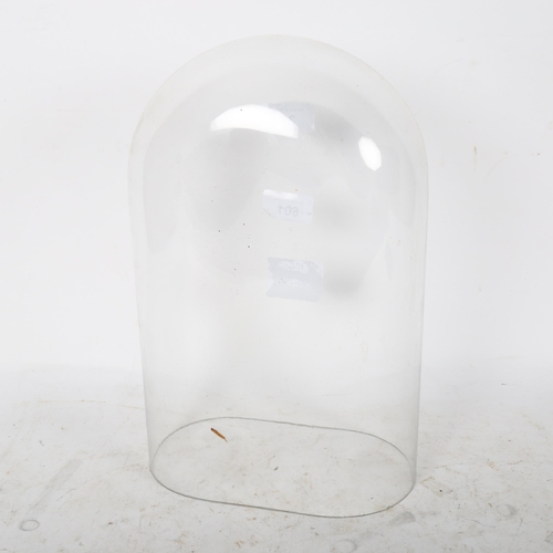 601 - A glass dome, internal measurements: W19cm, H30cm, D11cm