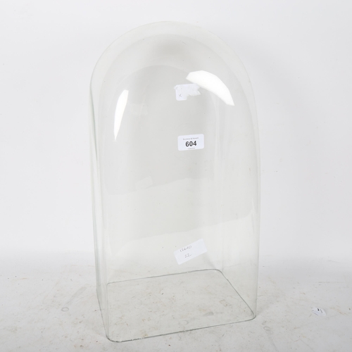 604 - A glass dome, internal measurements: W24cm, H47cm, D18.5cm