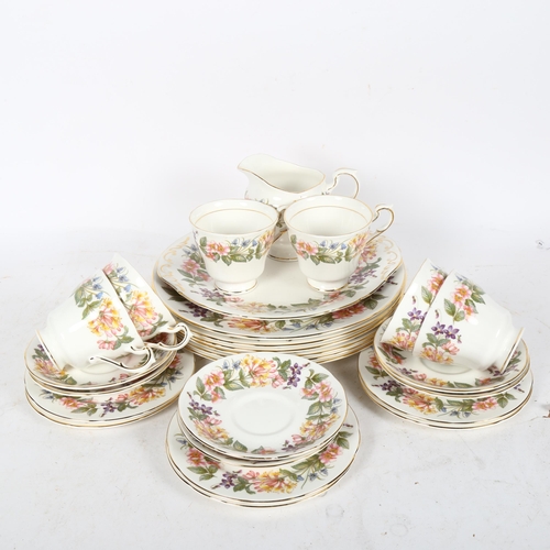 612 - A Paragon Country Lane part-service, comprising of 6 dinner plates, a cake plate, 6 cups saucers and... 