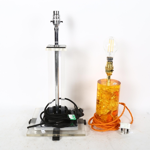 617 - A modernist design perspex and chromed table lamp, and an amber design table lamp (2)