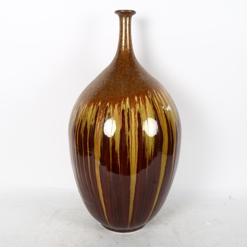 618 - A drip glazed Art pottery vase, height 56cm