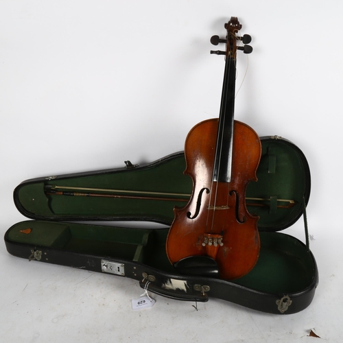 629 - A Vintage violin, back length 36cm with bow and case