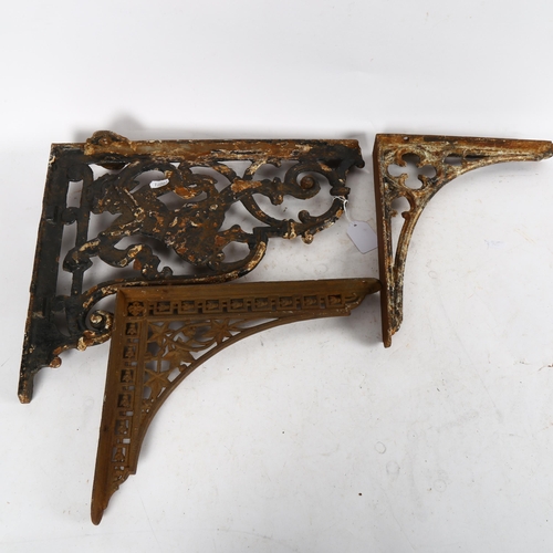 633 - 3 Antique cast-iron brackets, largest 40cm