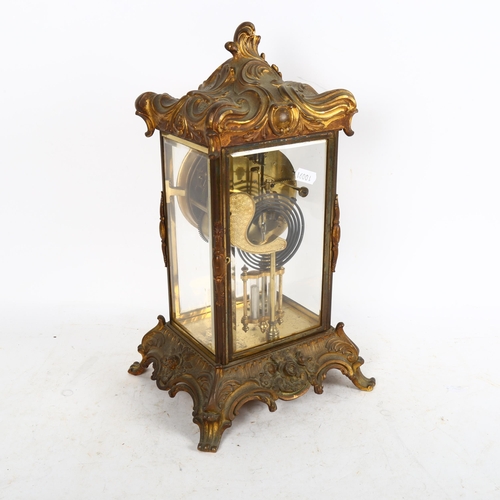 643 - A Victorian gilt-brass 4-glass 8-day mantel clock, with enamelled dial and Roman numerals, striking ... 