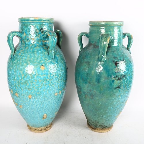 644 - A pair of large Hamadan turquoise glaze pottery oil jars (1 A/F), height 54cm