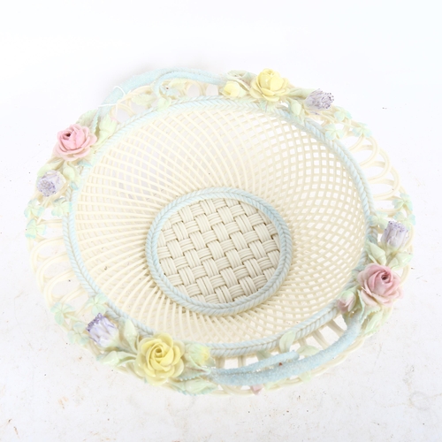 646 - A Belleek delicate pierced latticework basket, with applied flowers, width 22cm