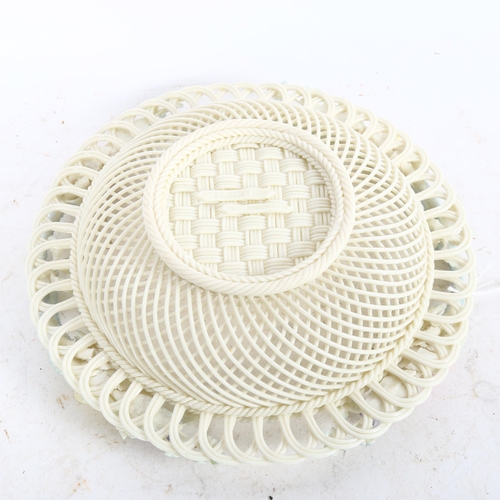 646 - A Belleek delicate pierced latticework basket, with applied flowers, width 22cm