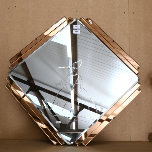 647 - An Art Deco style peach and clear glass geometric mirror, etched design, width 72cm