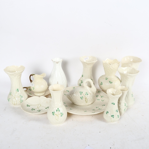 652 - Various Belleek porcelain vases, 2-handled cake plate, a swan ornament etc, and a Royal Tara vase (1... 