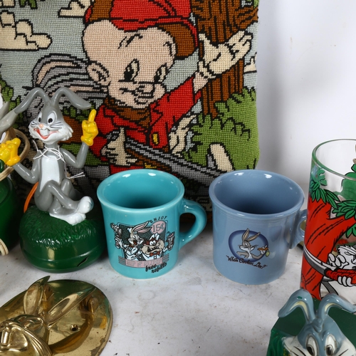 654 - A collection of Bugs Bunny memorabilia, including clock, stick telephone, mugs etc