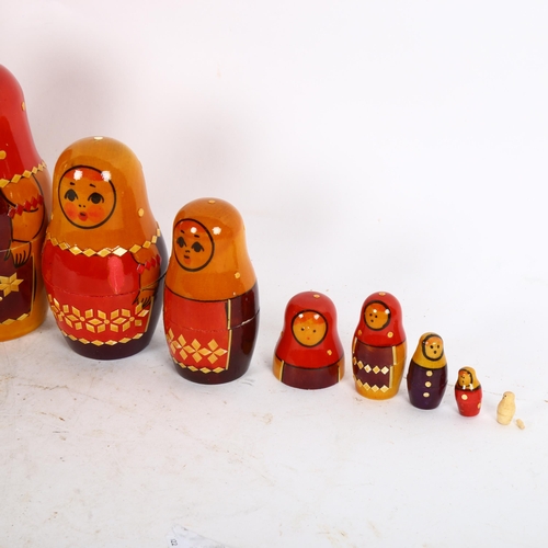 655 - A set of wooden Russian Matryoshka dolls