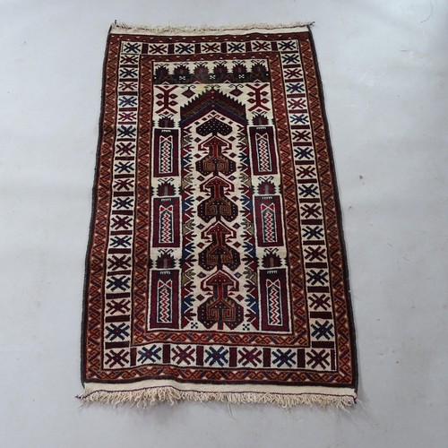 2379 - A red and cream ground Afghan prayer rug, 150cm x 83cm