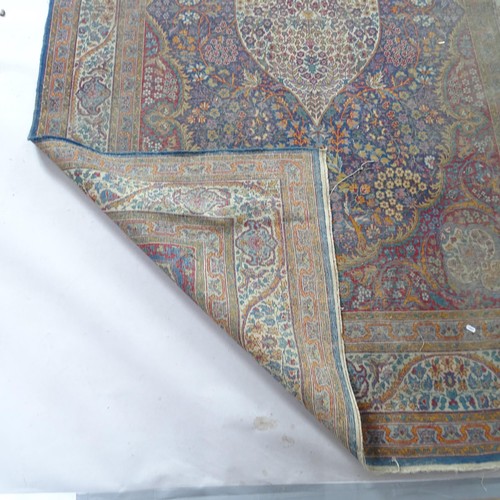 2395 - An Antique Persian Keshan carpet, 280cm x 188cm