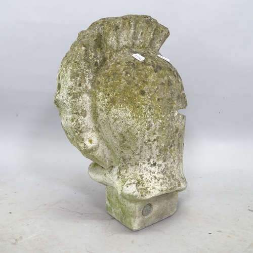 2694 - A weathered concrete garden ornament, in the form of a Corinthian helmet