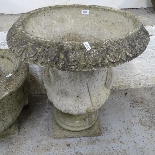 2708 - A weathered concrete garden urn, D58cm, H68cm