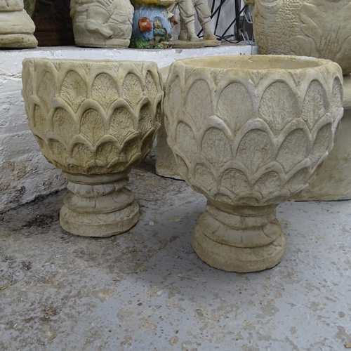 2723 - A pair of pineapple deep urns, on circular bases, 40cm x 52cm