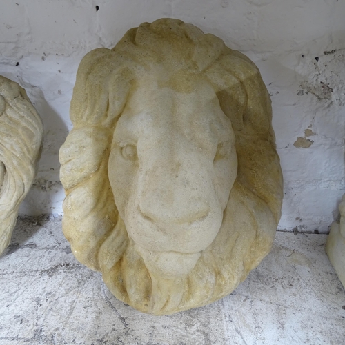 2729 - A concrete lion mask, 30cm x 35cm