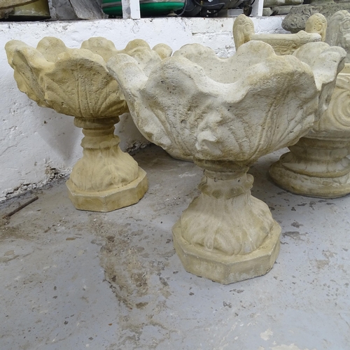 2733 - A pair of 2-sectional concrete garden planters, depicting tulips, 45cm x 50cm