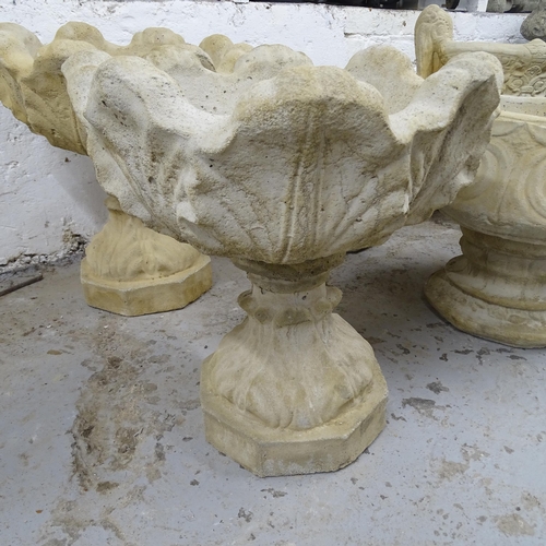 2733 - A pair of 2-sectional concrete garden planters, depicting tulips, 45cm x 50cm