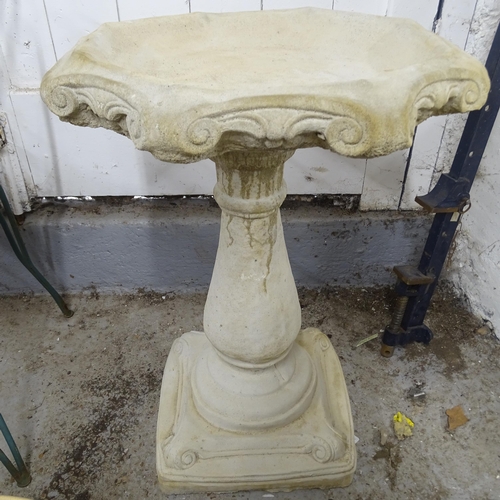 2736 - A 2-sectional concrete garden bird bath, with Gothic style hexagonal top, 46cm x 68cm