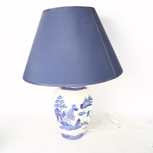 815 - A Spode china Oriental design blue and white pattern lamp with shade, height including shade 60cm