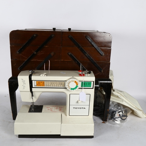 869 - An Art Deco cantilever sewing box, and Toyota sewing machine (2)