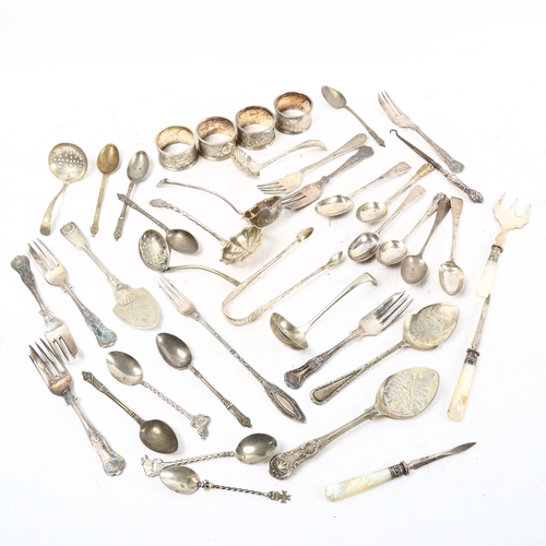 1009 - 6 various silver teaspoons, a silver-handled button hook, and a quantity of plated teaspoons, napkin... 