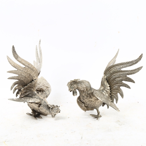 1018 - A pair of small silver plated table pheasants