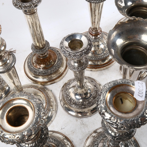 1026 - A group of Antique silver plate on copper candlesticks, and a pair of plated vases (11)