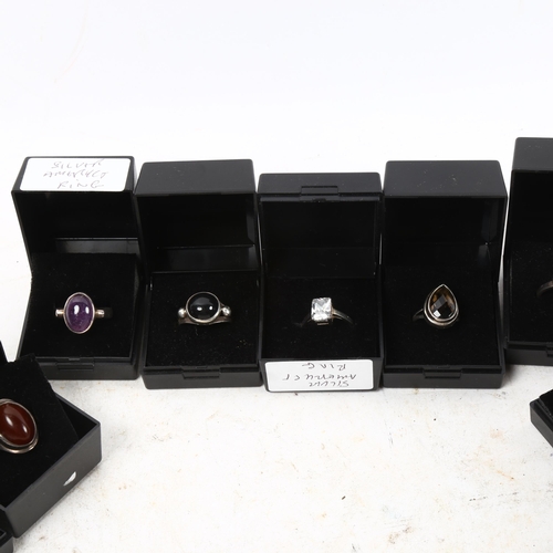 1042 - 10 modern silver and stone set rings (all boxed)