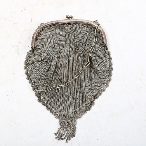 1063 - An early 19th century silver plated lady's mesh evening bag