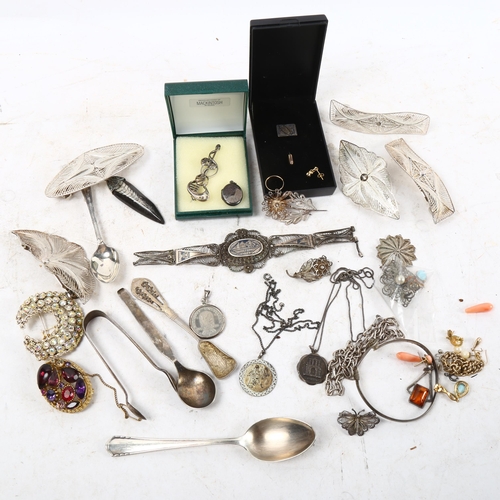 1066 - A collection of silver filigree brooches, a Siam silver and niello filigree panel bracelet etc