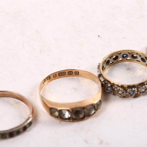 1070 - A 9ct gold stone set ring, an eternity ring, and 2 others