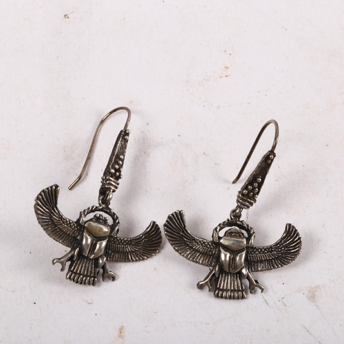 1074 - A pair of Egyptian silver scarab beetle earrings, on shepherd hook fittings, earring height 44mm, 8.... 