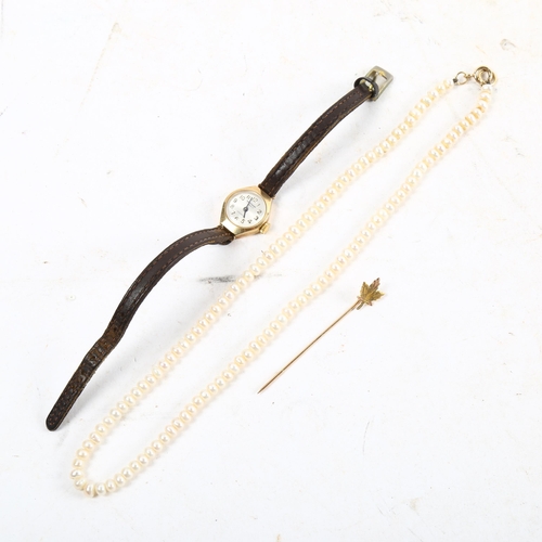 1075 - A lady's Waltham 9ct gold-cased wristwatch, a 10ct gold stick pin, and a pearl choker necklace with ... 