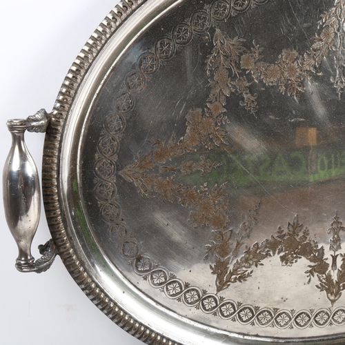 1089 - A Victorian silver plated oval 2-handled tea tray, with engraved decoration, width 63cm