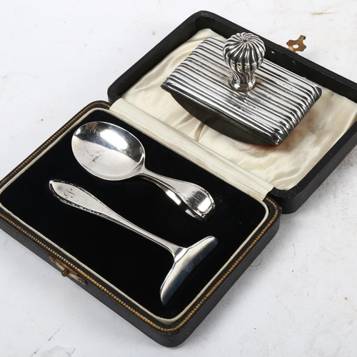 1095 - A cased silver christening set, and a Victorian silver desk blotter