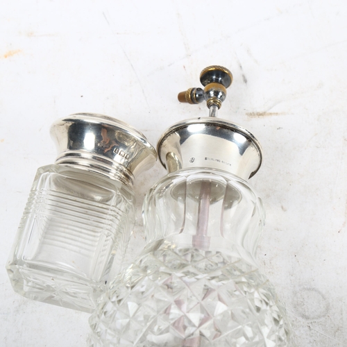 1107 - A glass and sterling silver-mounted atomiser, and a silver-topped dressing table bottle (2)