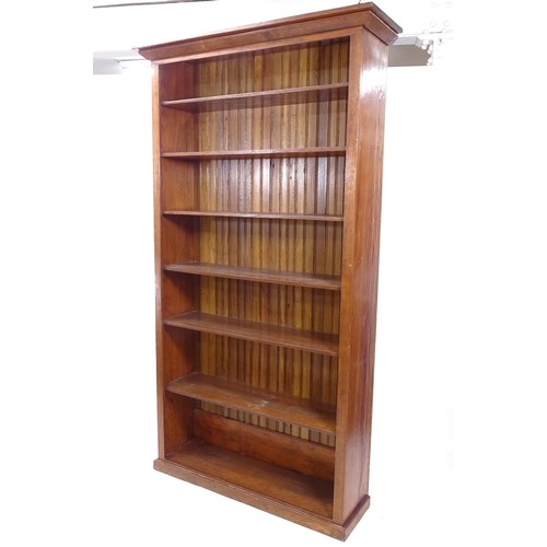 2399 - A large oak open bookcase with 6 fixed shelves, 125cm x 230cm x 40cm