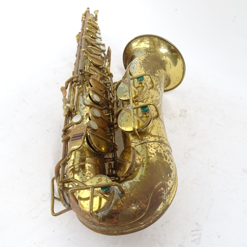 258 - A brass lacquered World saxophone, serial no. 24561, in hardshell case