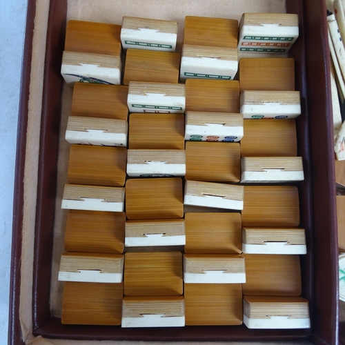 367 - A Chad Valley Mahjong bone and bamboo set, cased with stands