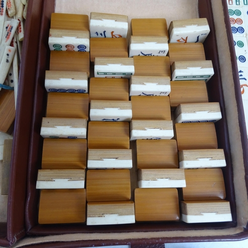 367 - A Chad Valley Mahjong bone and bamboo set, cased with stands